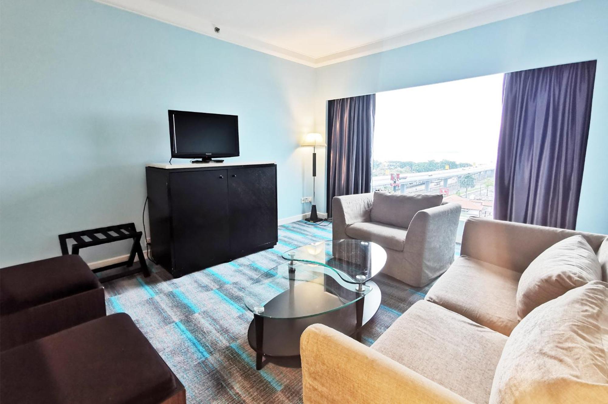 Thistle Johor Bahru Exterior foto Living room